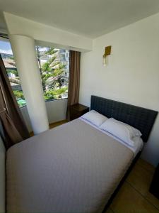 Postel nebo postele na pokoji v ubytování Duplex en el centro!! + 14 fotografií