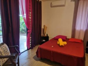 Ένα ή περισσότερα κρεβάτια σε δωμάτιο στο Fare Mape