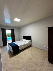 Postel nebo postele na pokoji v ubytování Beira-Mar Piscina e Churrasco + 27 fotografií