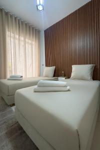 Voodi või voodid majutusasutuse BlueBreak Aourir toas