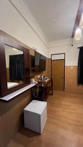 Μια τηλεόραση ή/και κέντρο ψυχαγωγίας στο City Garden Bali Dwipa Hotel, Kuta