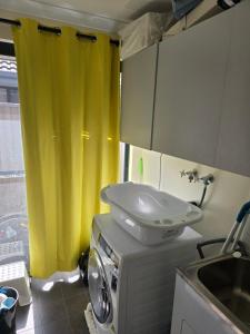 Kuchyň nebo kuchyňský kout v ubytování R n M Guest House