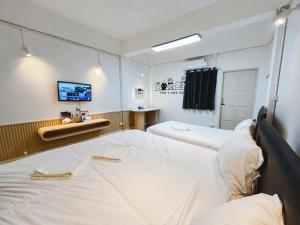 Postel nebo postele na pokoji v ubytování Amphawahorsefarm + 12 fotografií