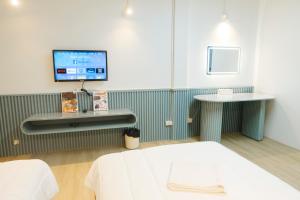 TV a/nebo společenská místnost v ubytování Amphawahorsefarm