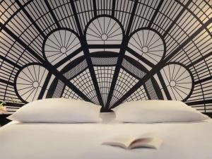 Ένα ή περισσότερα κρεβάτια σε δωμάτιο στο Mercure Paris Porte De Versailles Expo