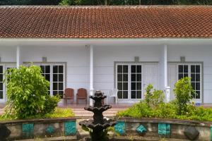 Κήπος έξω από το Hotel Purnama Lenggang