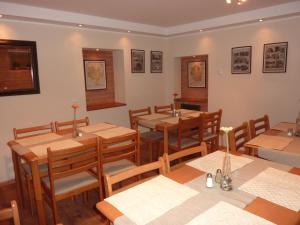 A restaurant or other place to eat at Zajazd Arka