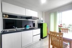 Kuchyň nebo kuchyňský kout v ubytování Risa Plus