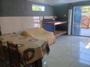 En eller flere senge i et værelse på Casa Praia dos Ingles