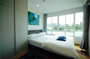 Postel nebo postele na pokoji v ubytování Risa Plus