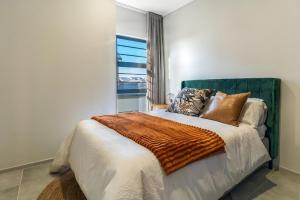 En eller flere senge i et værelse på Atlas Luxury Lifestyle