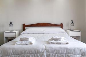 Un pat sau paturi într-o cameră la Casa del viento