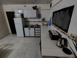 Kuchyň nebo kuchyňský kout v ubytování Hospedaje SKYHOME II + 5 fotografií