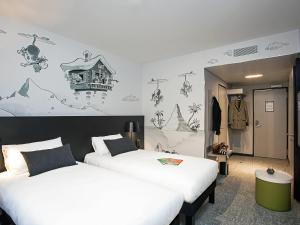 Voodi või voodid majutusasutuse ibis Styles Genève Carouge toas +91 fotot