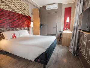 Postel nebo postele na pokoji v ubytování ibis Iquique + 65 fotografií