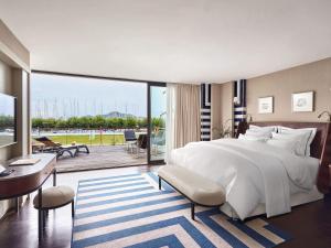 Ένα ή περισσότερα κρεβάτια σε δωμάτιο στο Rixos Premium Göcek - Adult Only