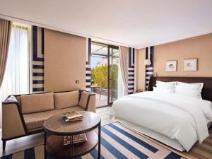 Ένα ή περισσότερα κρεβάτια σε δωμάτιο στο Rixos Premium Göcek - Adult Only