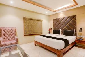 Voodi või voodid majutusasutuse Super Townhouse Oak Amity University Patna Formerly The Golden Crown toas