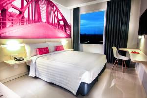 Letto o letti in una camera di favehotel Sudirman Bojonegoro