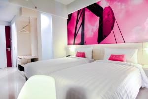 Letto o letti in una camera di favehotel Sudirman Bojonegoro