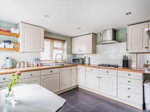 Køkken eller tekøkken på Ivy Cottage