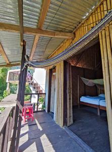 Μπαλκόνι ή βεράντα στο Veranda guesthouse and Bungalows +3 φωτογραφίες