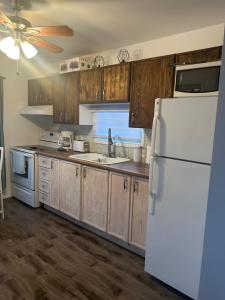 Kuchyň nebo kuchyňský kout v ubytování Le petit chalet Chertsey + 12 fotografií