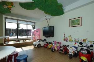 Un televizor și/sau centru de divertisment la Happy Together B&B