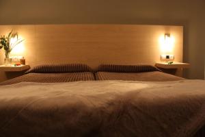 Postel nebo postele na pokoji v ubytování Hotel Pontes do Eume