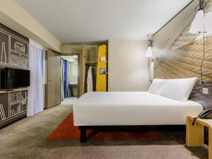 Postel nebo postele na pokoji v ubytování ibis Tbilisi Stadium + 90 fotografií