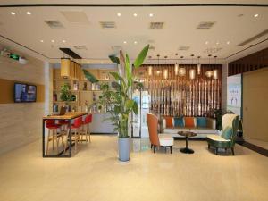 TV a/nebo společenská místnost v ubytování City Comfort Inn Huangshi Yangxin Mingyuewan Park