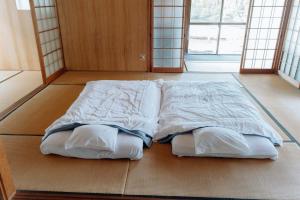 Postel nebo postele na pokoji v ubytování Kobayashi Residence - Vacation STAY 60965v