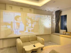 a childrens bedroom with a bed and a living room at Four P Home and Studio in Ho Chi Minh City