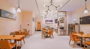 TV a/nebo společenská místnost v ubytování City Comfort Inn Qingyuan Fogang Coach Terminal