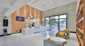 a lobby of a store with a person in the background at Green Tree Inn Express Zhejiang Zhoushan Xincheng Zheda in Zhoushan