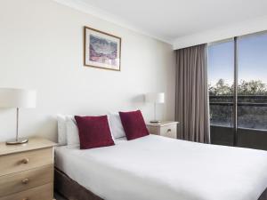 Ένα ή περισσότερα κρεβάτια σε δωμάτιο στο BreakFree Capital Tower Apartments +66 φωτογραφίες