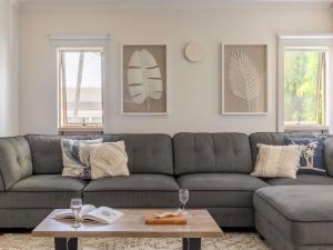 a living room with a couch and a coffee table at Mantra Amphora in Palm Cove +166 photos