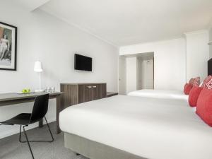 Et tv og/eller underholdning på Mantra Legends Hotel