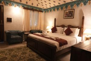 Voodi või voodid majutusasutuse Estherea Bagh Ranthambhore Tiger Territory toas +19 fotot