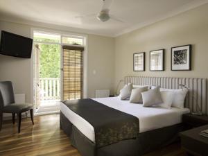 Ένα ή περισσότερα κρεβάτια σε δωμάτιο στο Peppers Craigieburn Resort +201 φωτογραφίες