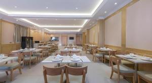 Restaurace v ubytování Vienna Hotel Fuzhou Changle Zhenghe Metro Station