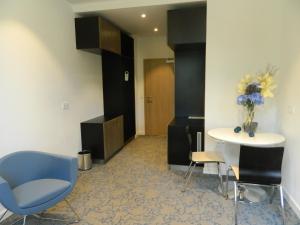 A seating area at Hotel Bílý Páv