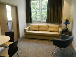 A seating area at Hotel Bílý Páv