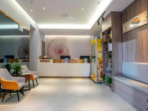 Vstupní hala nebo recepce v ubytování Shell Hotel Hefei Feixi County Huamucheng