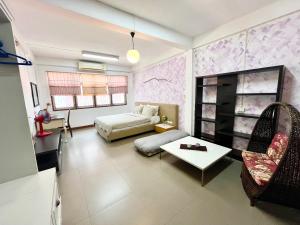 Et opholdsområde på Anne & Tan Stylist Homestay