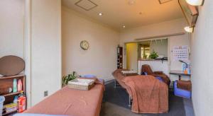 Ένα ή περισσότερα κρεβάτια σε δωμάτιο στο Itabashi Hotel Hilltop +167 φωτογραφίες