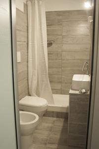 Koupelna v ubytování Hotel Agorà