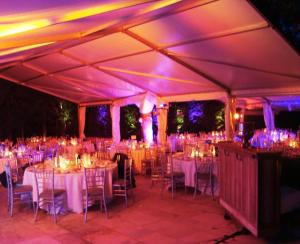 a large tent with tables and chairs at night at Villa sur Golf Opio Valbonne in Opio +51 photos