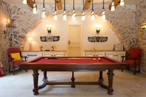 a billiard room with a pool table in a castle at Villa sur Golf Opio Valbonne in Opio