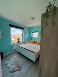 Postel nebo postele na pokoji v ubytování Residentie de Eikhof